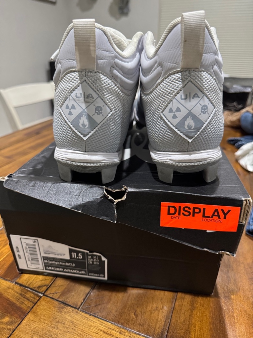 Gently used Under Armour White Men's Spotlight Franchise RM 2.0 Cleats.